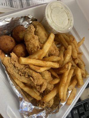 Perch plate with fries, cole slaw, and hush puppies