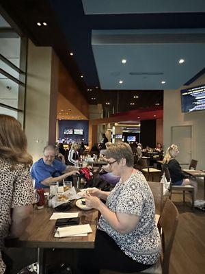 Restaurant with tables & TVs