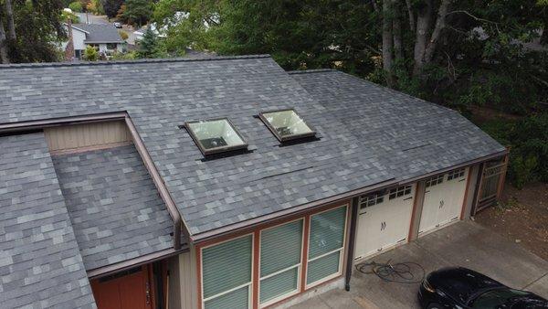 Shake T/O, 1/2" Plywood, Malarkey Vista Install with Certainteed In-Deck Intake Vents, Certainteed Ridge Vent.