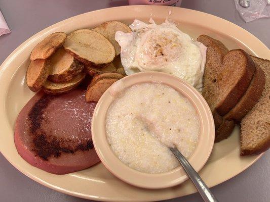 Bologna platter with grits and home fries