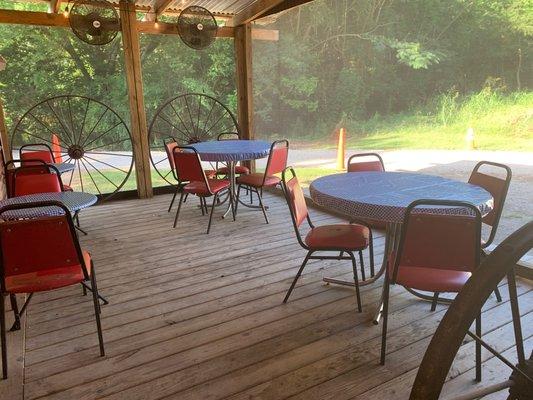 Screened-in deck dining area