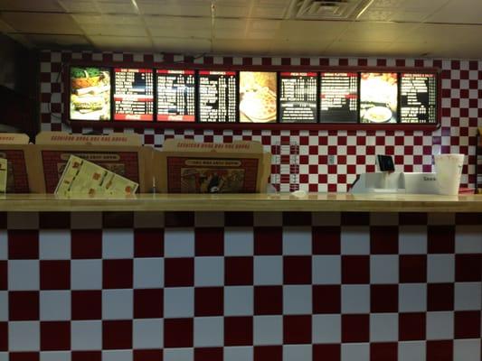 The counter and menu board.