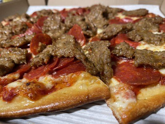 Great sausage on thin crust.