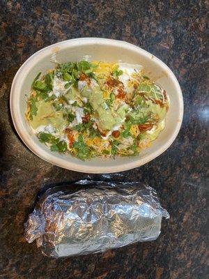 Cauliflower rice bowl with white chicken, Rice, Double Pinto beans, Triple mixed cheese burrito.