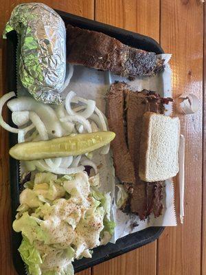 Sliced brisket/ 1 beef rib salad and corn on the cob