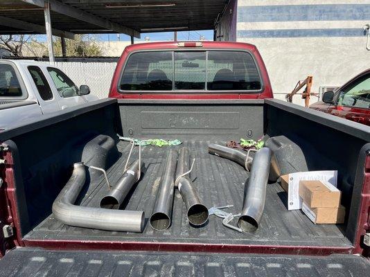 My truck and it's new exhaust in the OC Muffler Parking Lot