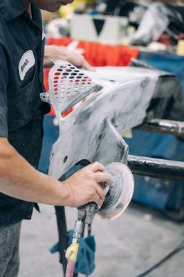 Preparing a Mclaren Rear Bumper after Damage.