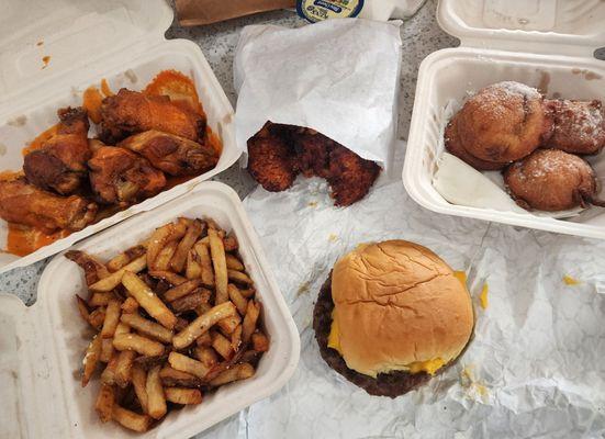 Cheeseburger, truffle fries, buffalo wings, chicken tenders, and fried oreos