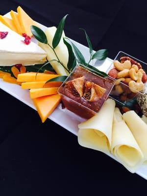 Cheddar, Brie, Provolone served with Salted Mixed nuts and Fig Preserves