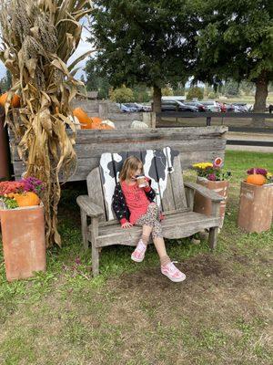 My Mini-Me - she had to strike a pose.  The bench was "too cool".