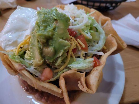 Taco salad w/ beef.  Great toppings, fresh & CRISPY shell!  Yummy!