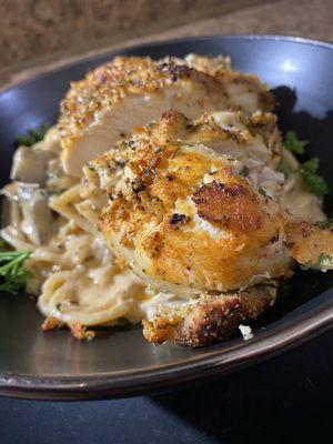 Juicy Italian Chicken atop Alfredo Pasta