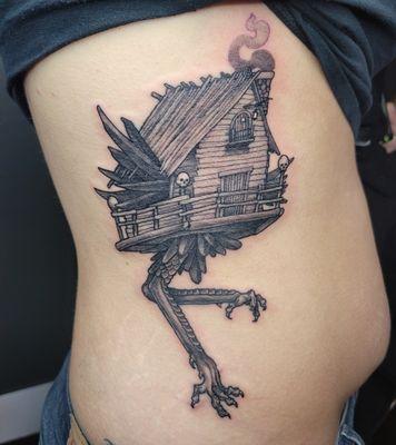 Fine line tattoo baba yaga witch hut