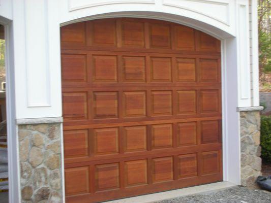 Clopay cedar raised panel door.