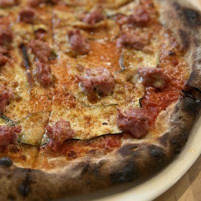 Fennel sausage, summer squash, & basil pizza