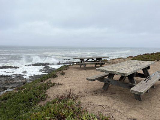 Picnic tables on the path not to far from parking lot