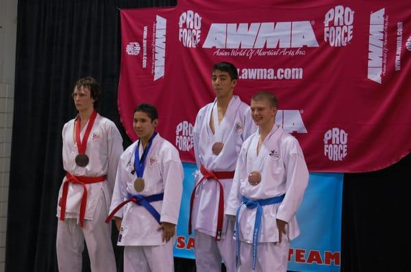 Kiyoto Higgins posing with other medal winners in the Mens black belt division at US Nationals 2011 in Arlington Texas.