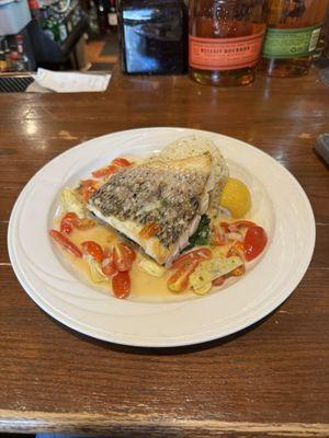 Sea Bass with tomato artichoke sauce