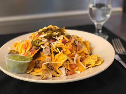 Nachos with a side of guacamole