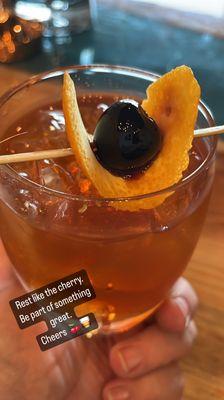 Delicious Old Fashioned  cocktail with luxardo cherries.