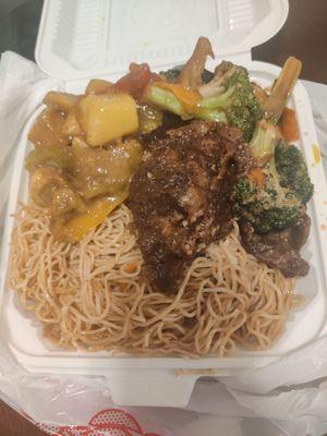 Too Good to Go order. Chow mein, probably beef and broccoli, curry chicken, and a piece of stewed or black pepper chicken?