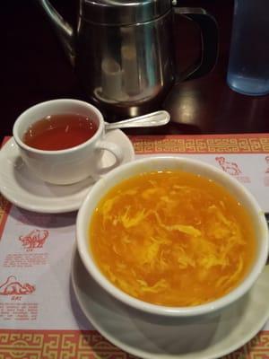 Egg drop soup. FYI they put green scallions on top.