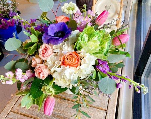 Jewel in the crown: purple anemone, tulips, roses, hydrangea, scabiosa