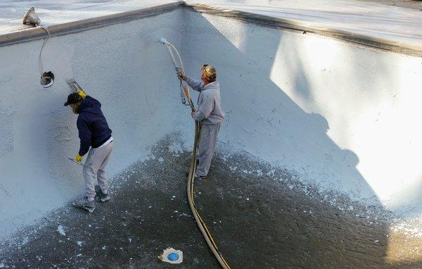 Swimming pool plaster application looks easy with the right material, equipment and crews.