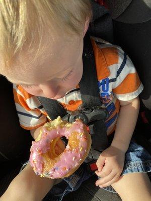 Smashed strawberry frosted donut.