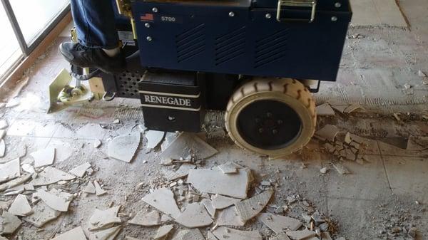 Removal of some tough ceramic tile in a home basement, using the smallest Renegade Floor Scraper...