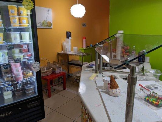 Counter and fridge at Dizin FruttiBerri of Watertown