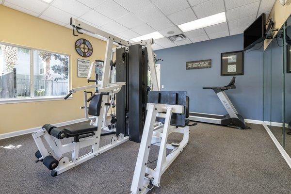 Fitness center with strength training equipment and cardio equipment