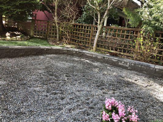 Retaining wall merging with existing landscape turned out great.