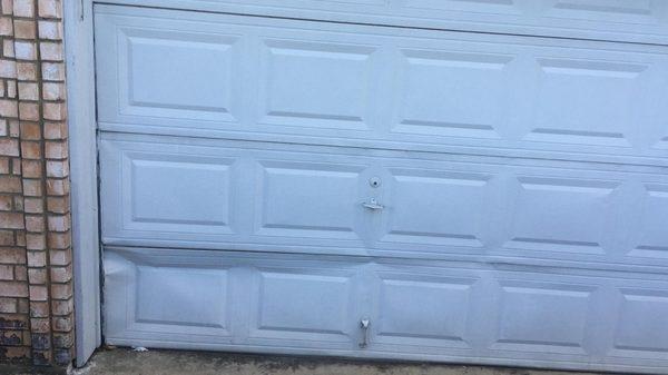 Dent Garage Door