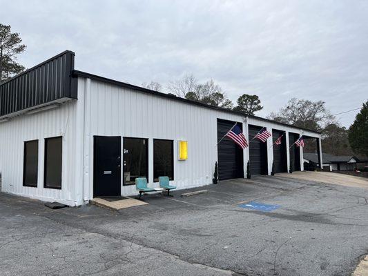 Fresh paint on the Pure Auto Repair Building.