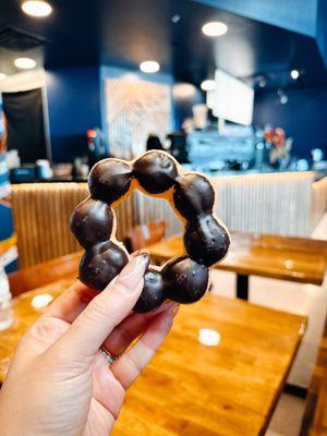 This chocolate mochi donut was delicious, and the coffee was excellent!