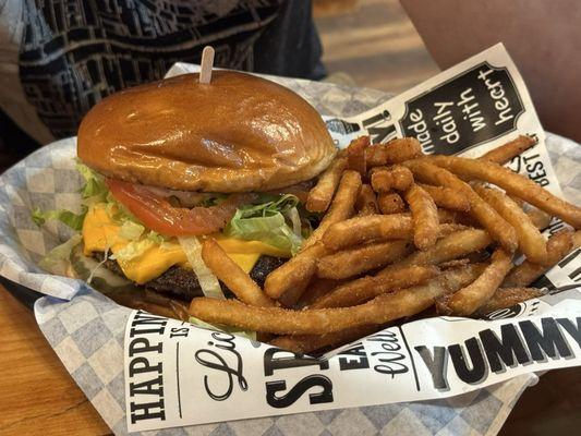 Bacon burger with fries.