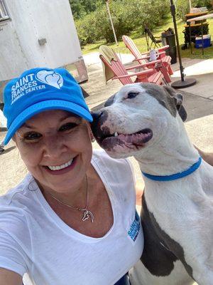 Saint Frances volunteer, Regina and shelter dog, Zorro participating at event