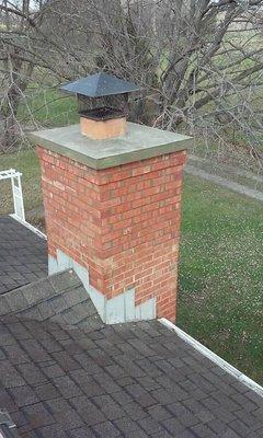 Chimney I tore down and relaid back and poured new concrete cap back on top