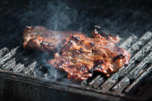 Three-day marinated, our Carne Asada is an all-natural steak grilled over an open flame topped with Mexican dry cheese, cilantro and onions.