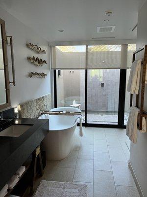 Bathroom with outdoor shower as well