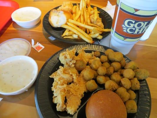 two 4 piece chicken tender combo plates with fries and fried okra and tea.