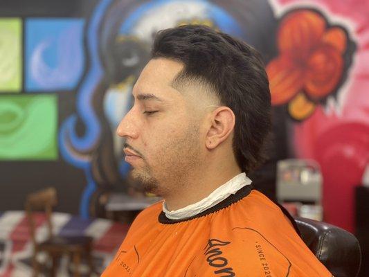 Taper mullet.         http://erikthebarber2.booksy.com