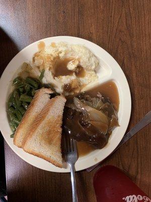 Hamburger steak, mashed potatoes and green beans