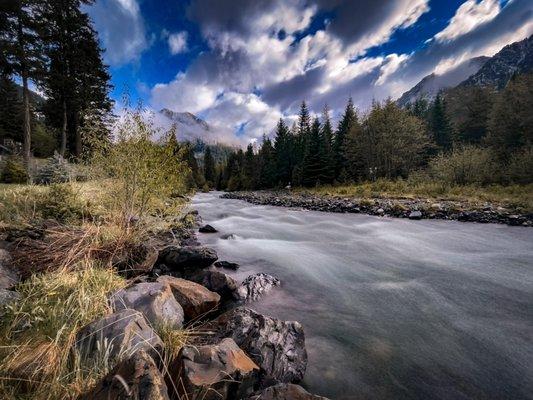 By the river