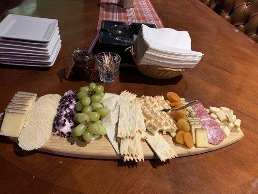 Left to right: cheddar parm with merlot rind, blueberry goat cheese, truffle goat cheese, brie, blumenkase cheese, fenugreek Gouda