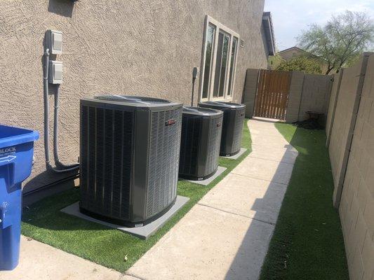 3 Brand New Trane compressors installed perfectly level on new pads.