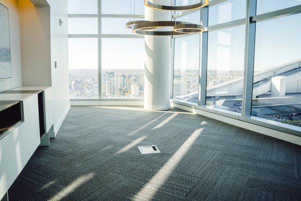 We installed carpet tile in a herringbone pattern for our client in their conference room