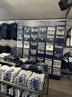 T-shirt wall. If they don't have one you like...what's wrong with you?