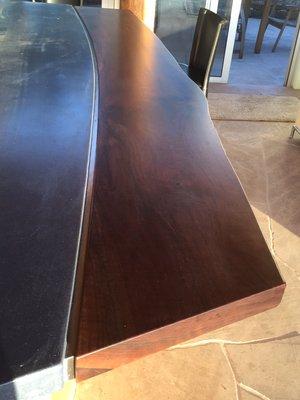 Custom made solid Walnut, live edged slab....  fit to existing concrete counter top.